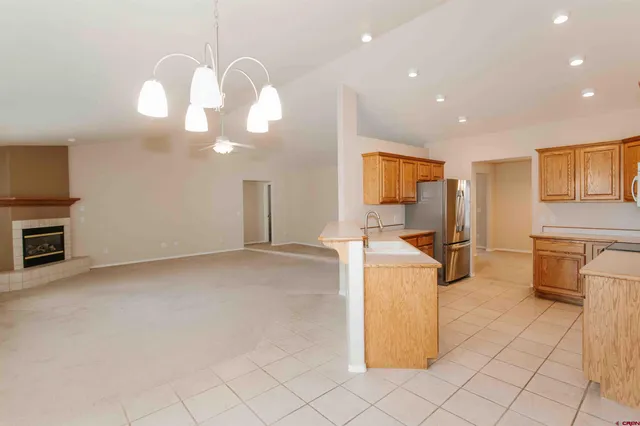 a view of a kitchen with furniture and a kitchen