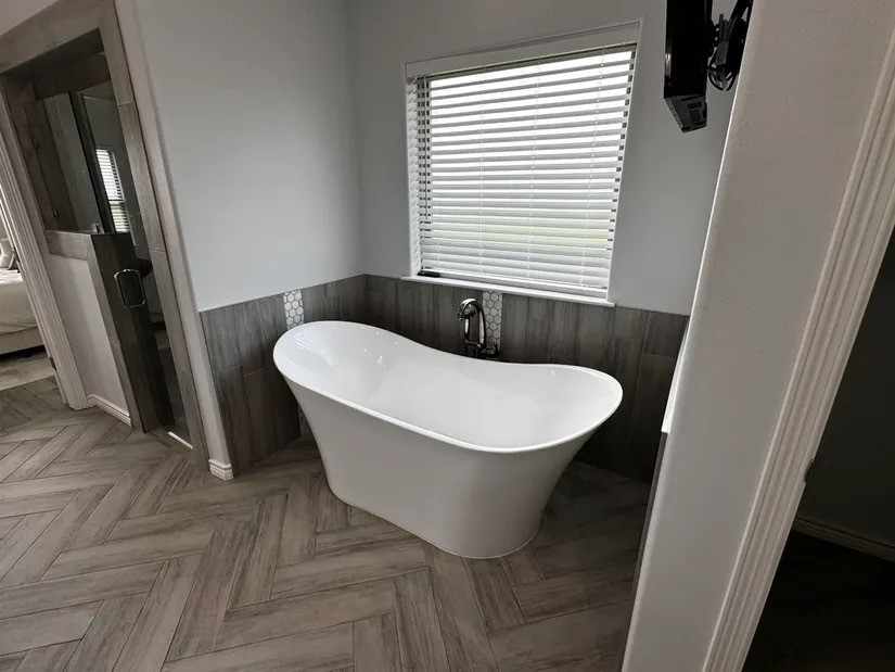 2295 Diamond D Lane Beaumont, TX 77713 - Photo 15 of 40 a bathroom with a sink and a mirror