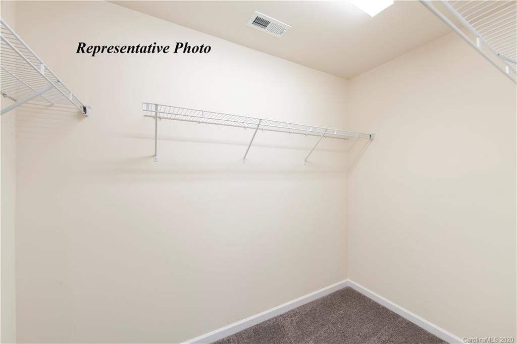 477 Hunters Dance Road, Unit 336 Fort Mill, SC 29708 - Photo 15 of 22 a view of small space with racks on the wall