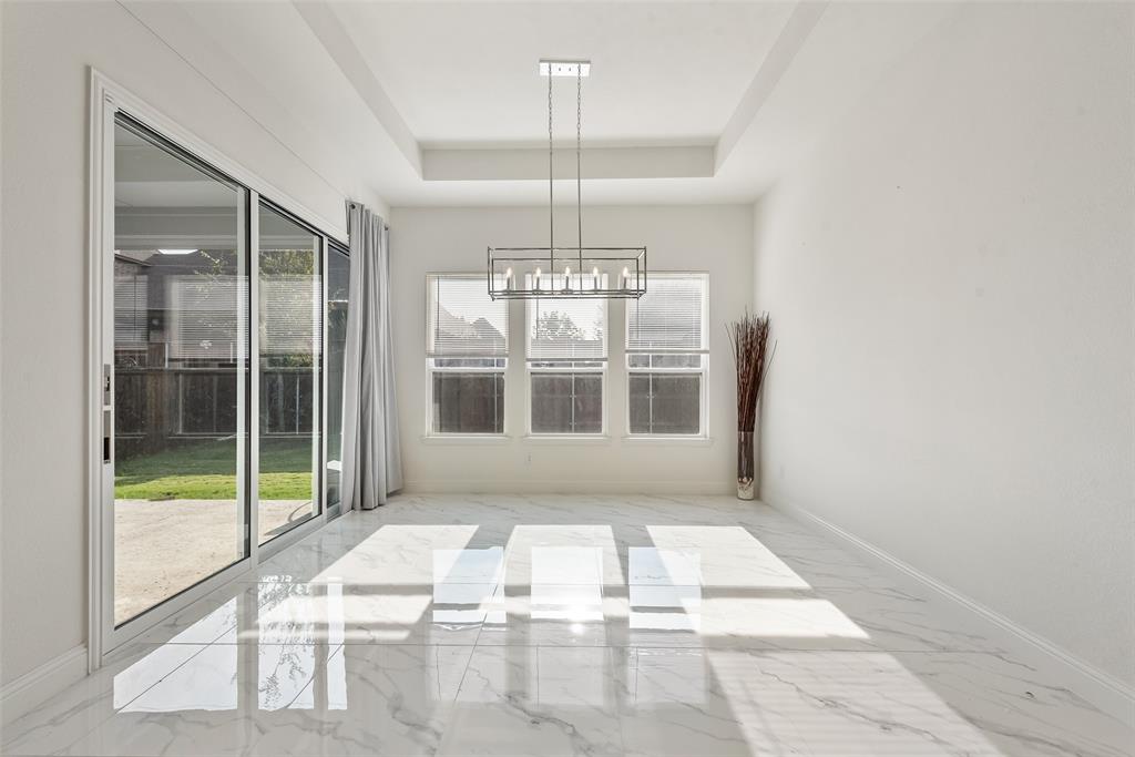 2714 Chambray Lane Mansfield, TX 76063 - Photo 17 of 32 a view of an empty room with a window