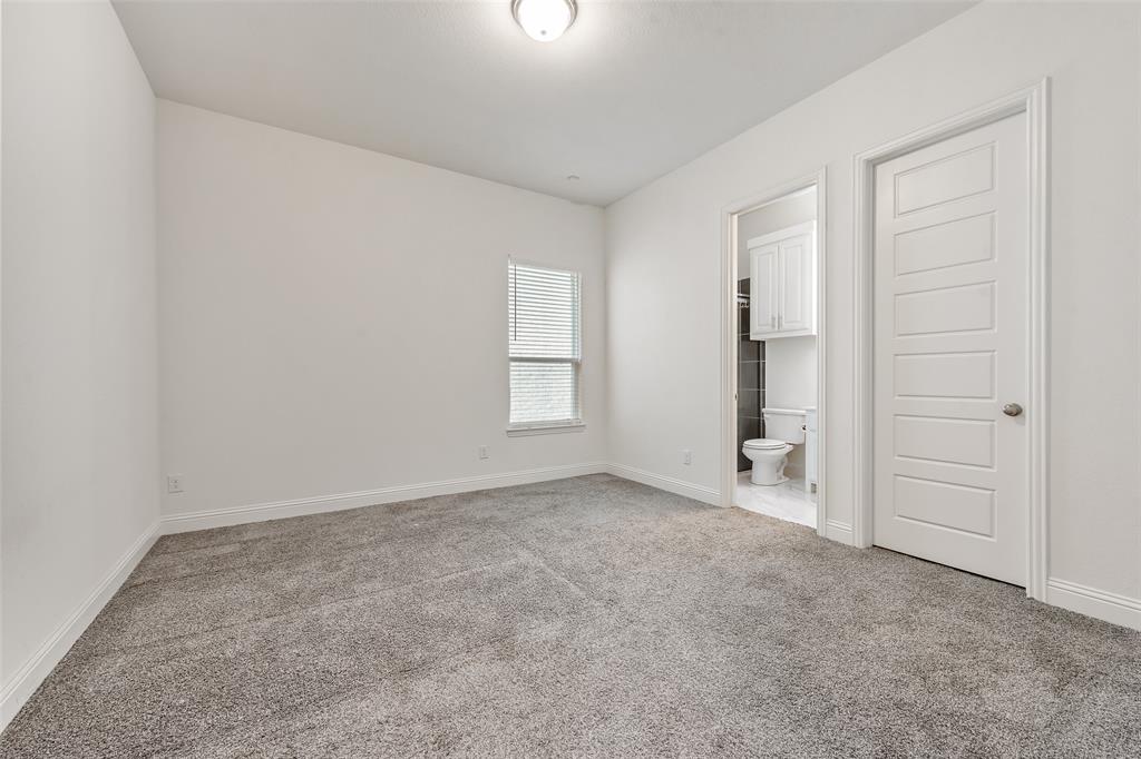2714 Chambray Lane Mansfield, TX 76063 - Photo 21 of 32 an empty room with windows