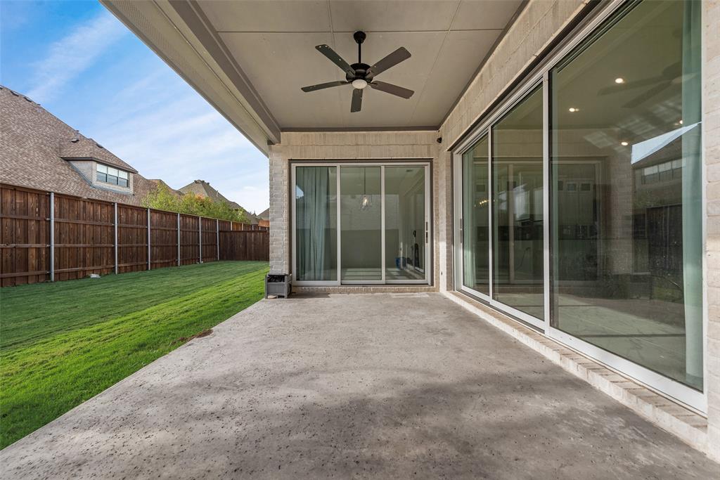 2714 Chambray Lane Mansfield, TX 76063 - Photo 29 of 32 a view of a porch with a table and a garden