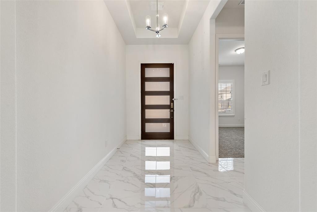 2714 Chambray Lane Mansfield, TX 76063 - Photo 7 of 32 an empty room with windows and closet