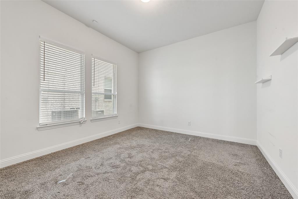 2714 Chambray Lane Mansfield, TX 76063 - Photo 8 of 32 an empty room with a window