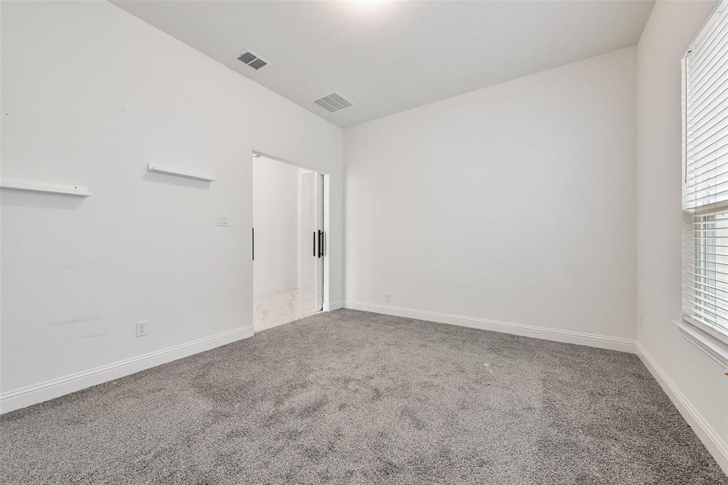 2714 Chambray Lane Mansfield, TX 76063 - Photo 9 of 32 an empty room with windows