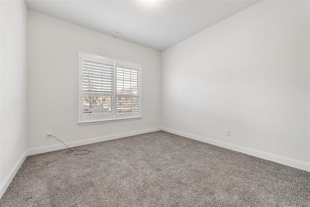 2714 Chambray Lane Mansfield, TX 76063 - Photo 10 of 32 an empty room with a window
