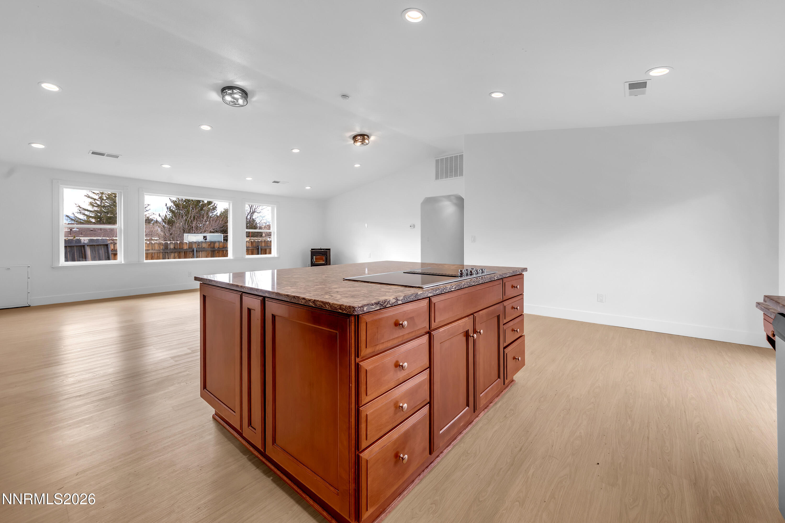 3825 Dyal Court Reno, NV 89508 - Photo 11 of 39 a kitchen with stainless steel appliances granite countertop a stove a sink and a refrigerator