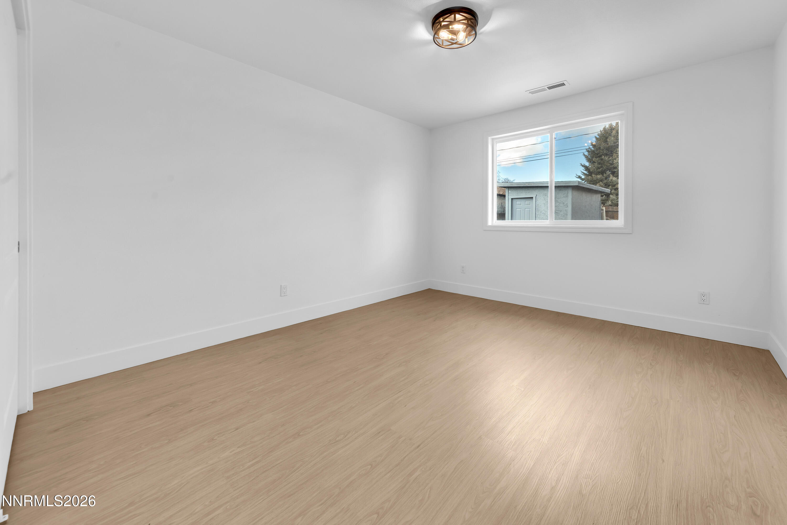 3825 Dyal Court Reno, NV 89508 - Photo 19 of 39 an empty room with a window