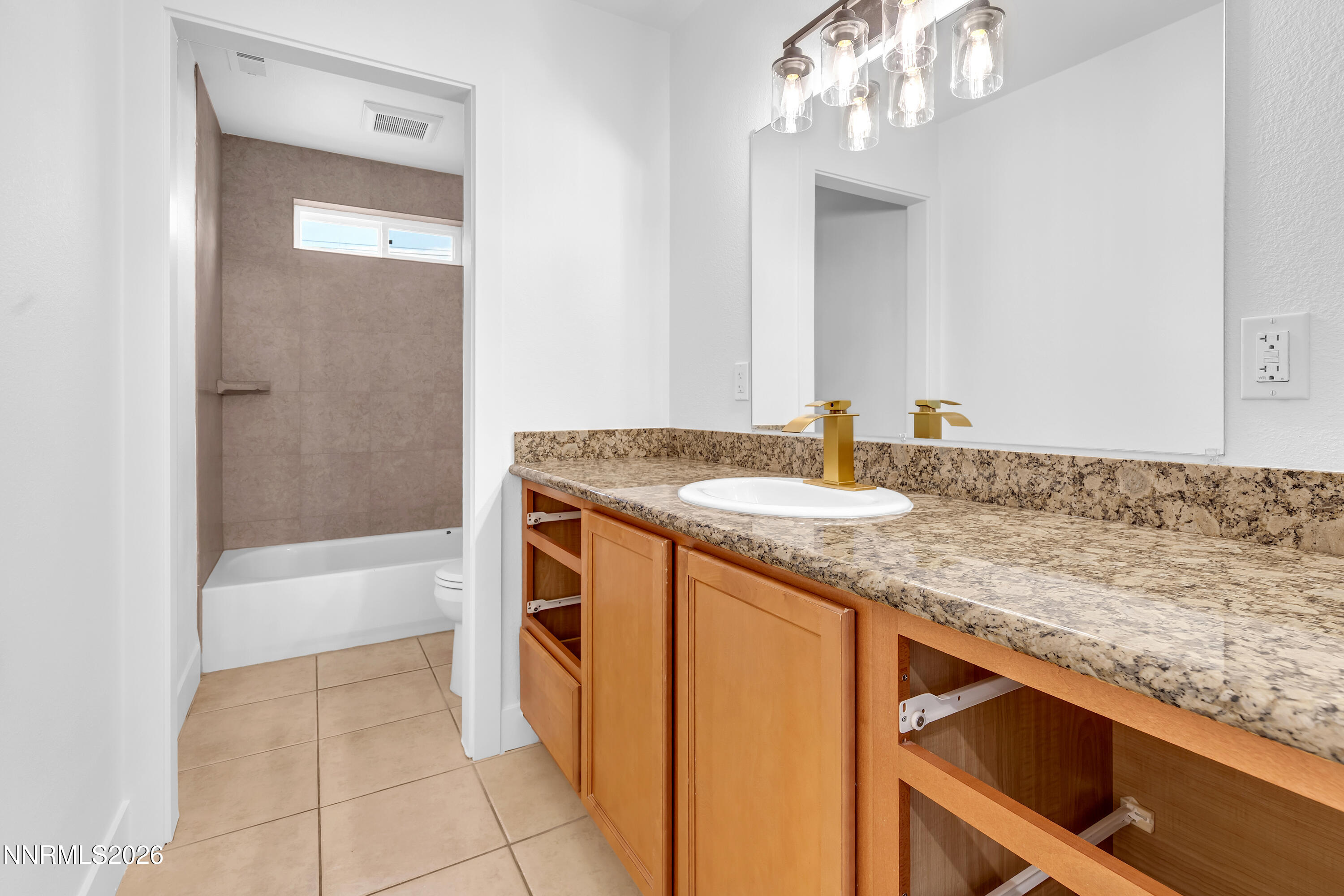 3825 Dyal Court Reno, NV 89508 - Photo 23 of 39 a bathroom with a granite countertop sink and a bathtub