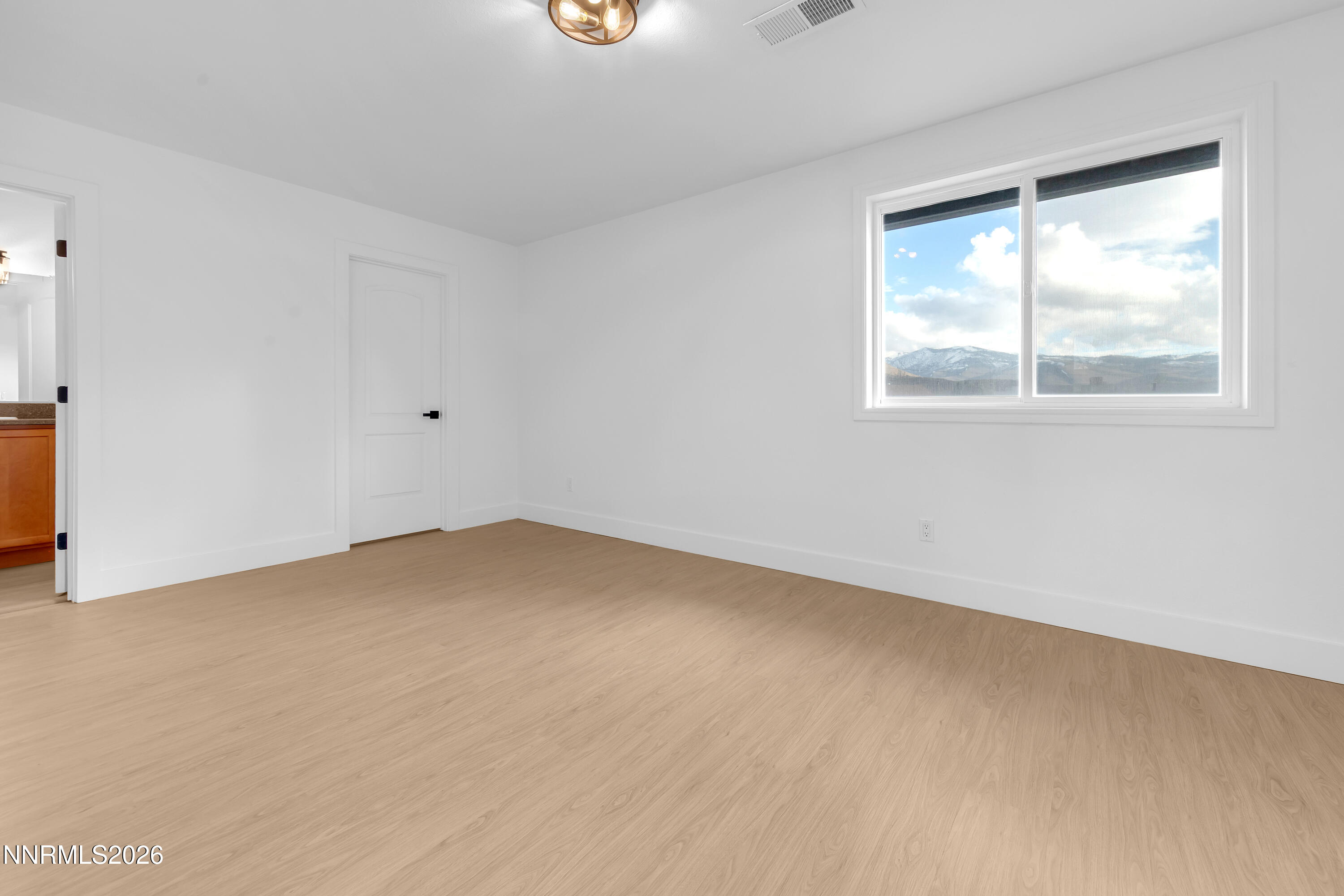 3825 Dyal Court Reno, NV 89508 - Photo 25 of 39 an empty room with a window
