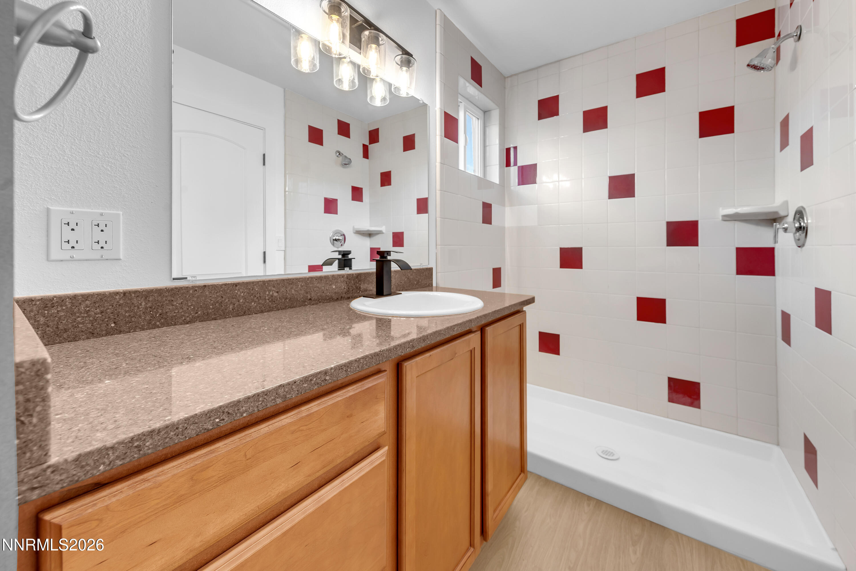 3825 Dyal Court Reno, NV 89508 - Photo 28 of 39 a bathroom with a sink a bath tub and a shower