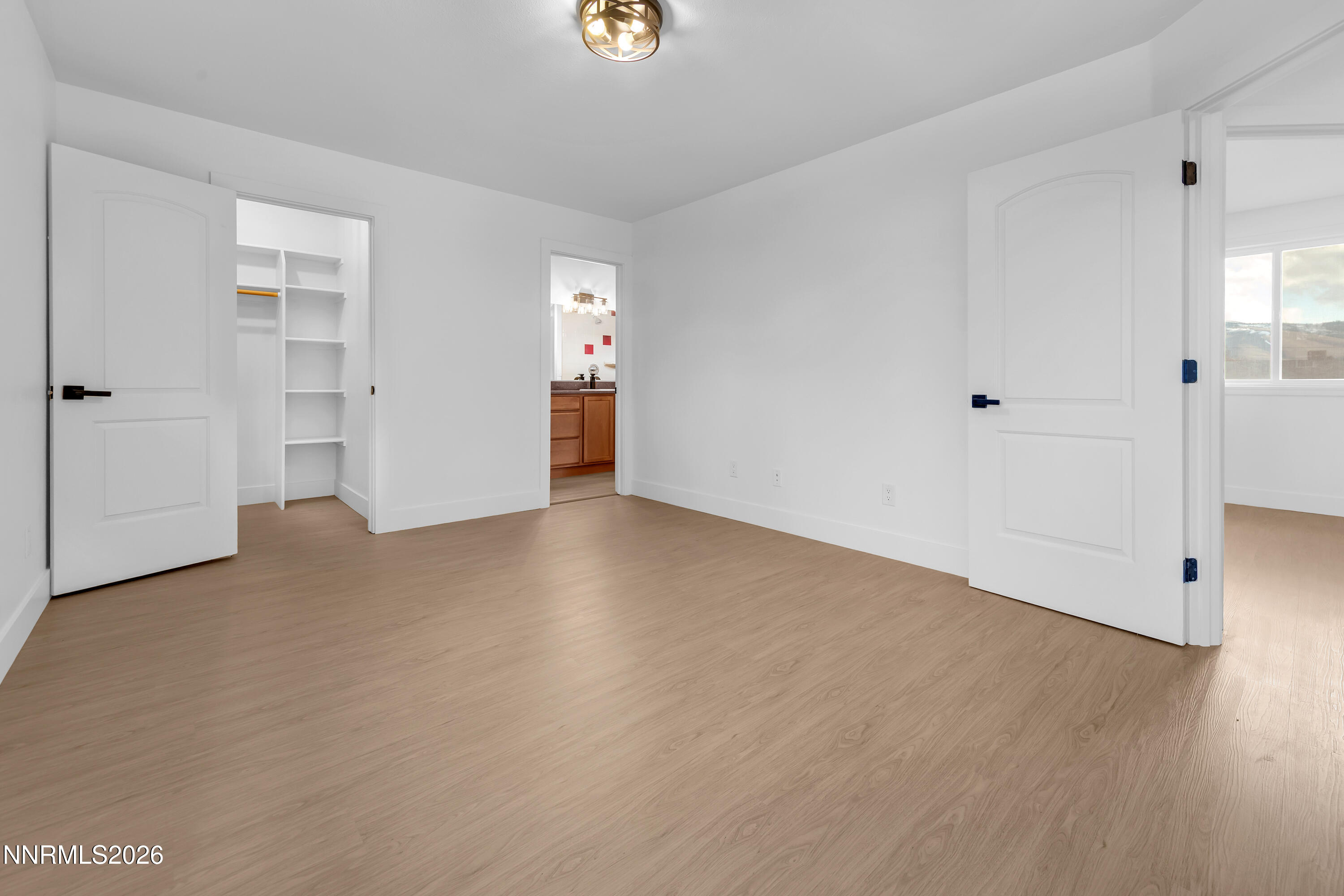 3825 Dyal Court Reno, NV 89508 - Photo 30 of 39 a view of empty room with wooden floor