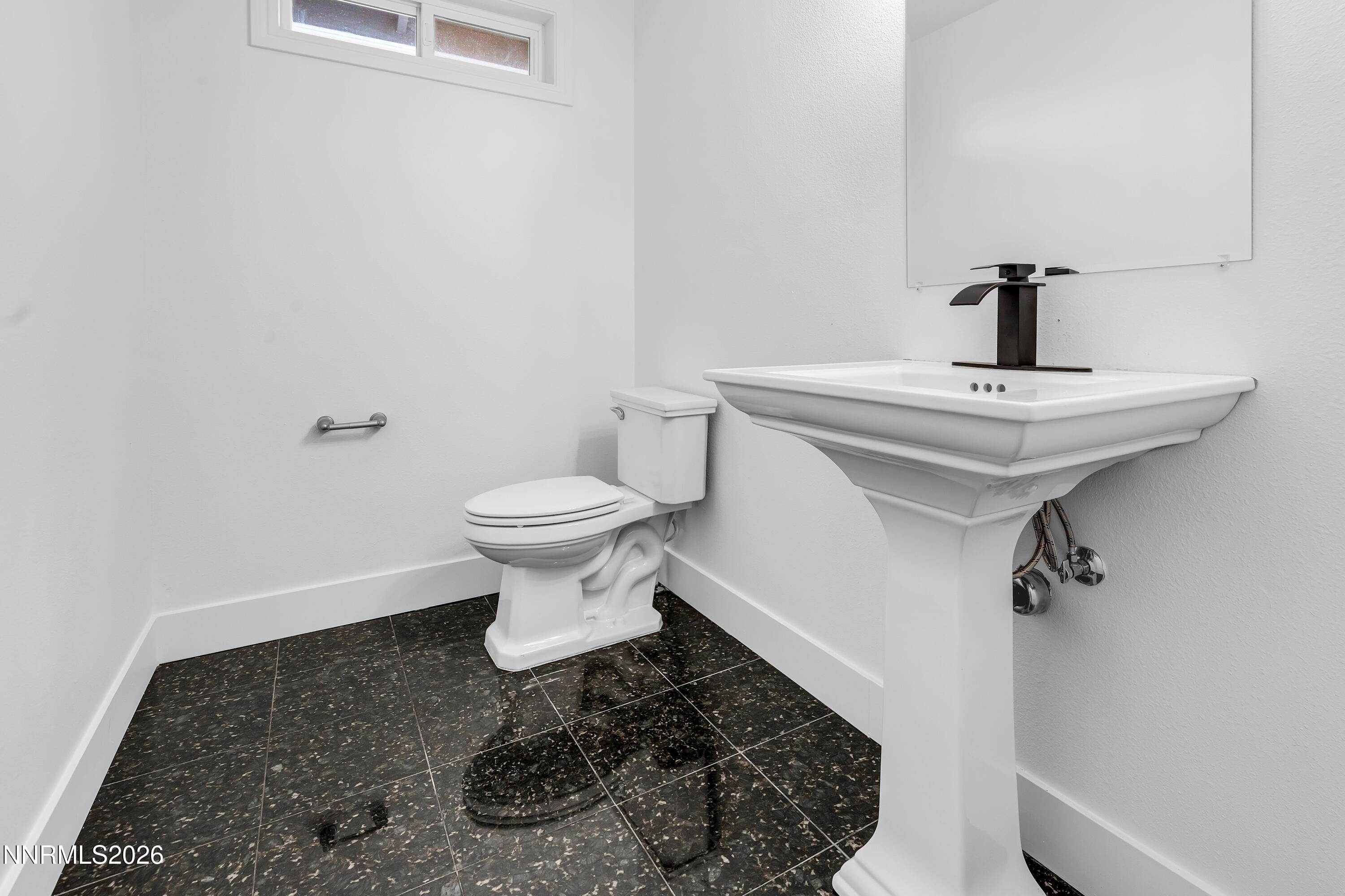 3825 Dyal Court Reno, NV 89508 - Photo 33 of 39 a bathroom with a sink toilet and a mirror