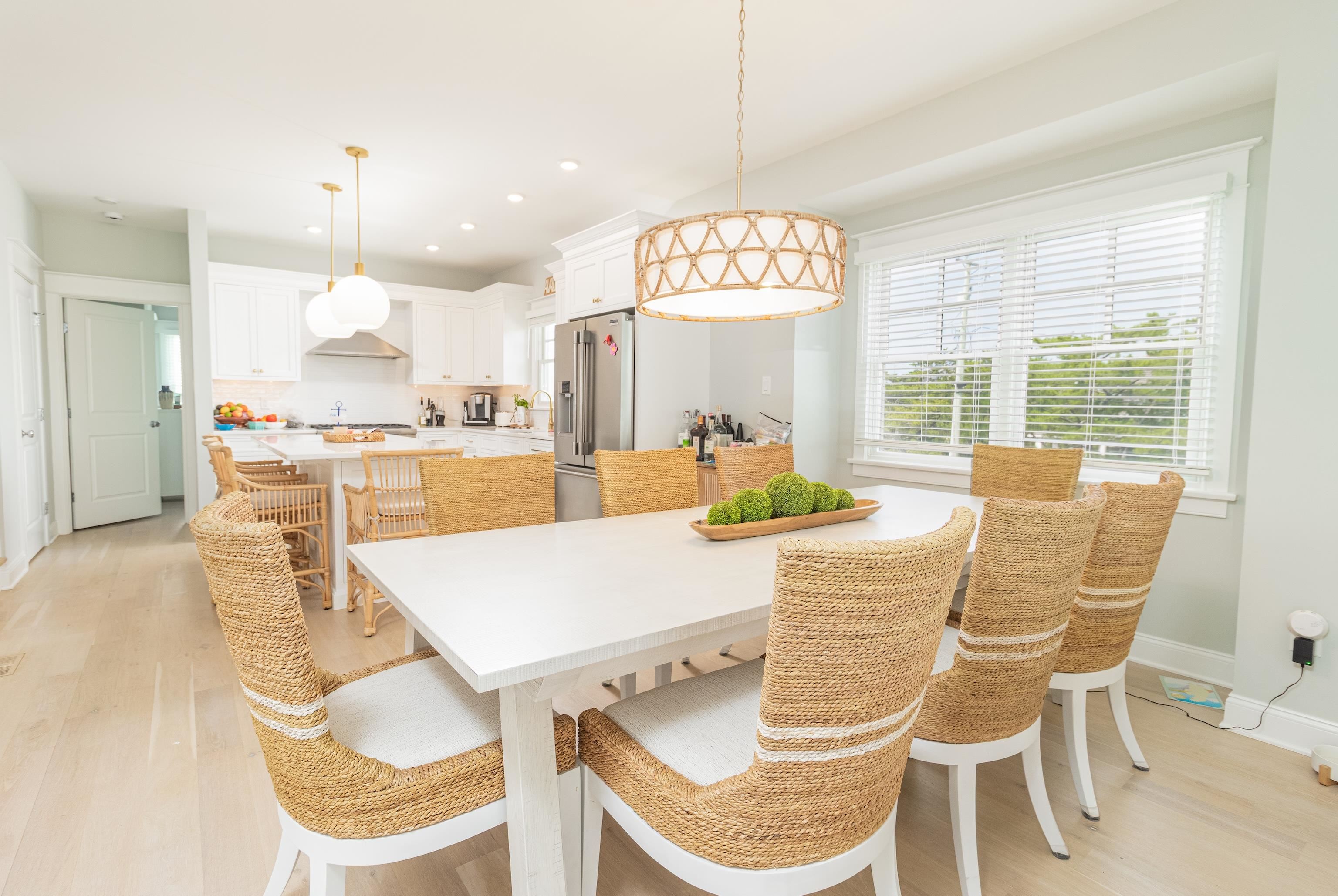 8 East 27th, Unit WEST Avalon, NJ 08202 - Photo 11 of 32 a view of a dining room with furniture window and outside view