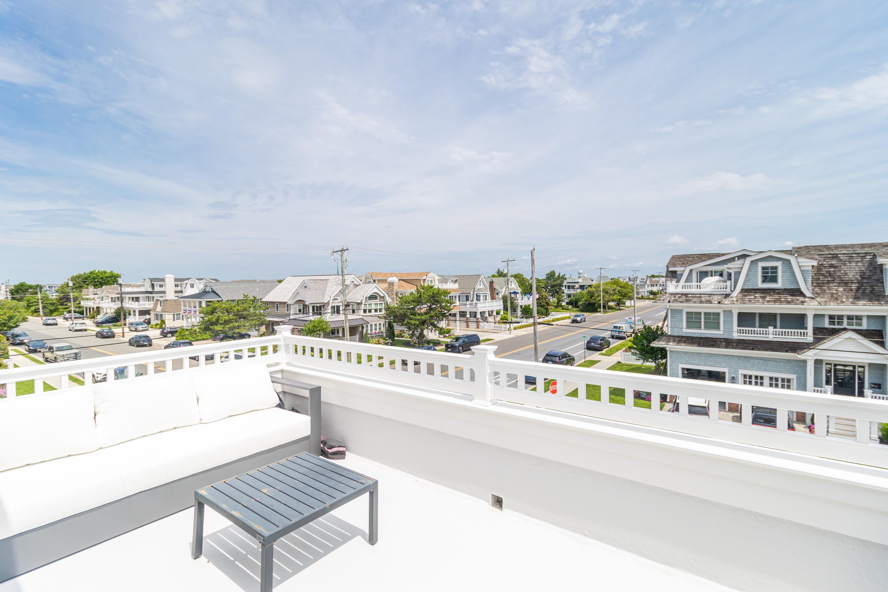 8 East 27th, Unit WEST Avalon, NJ 08202 - Photo 28 of 32 a view of a city from a terrace