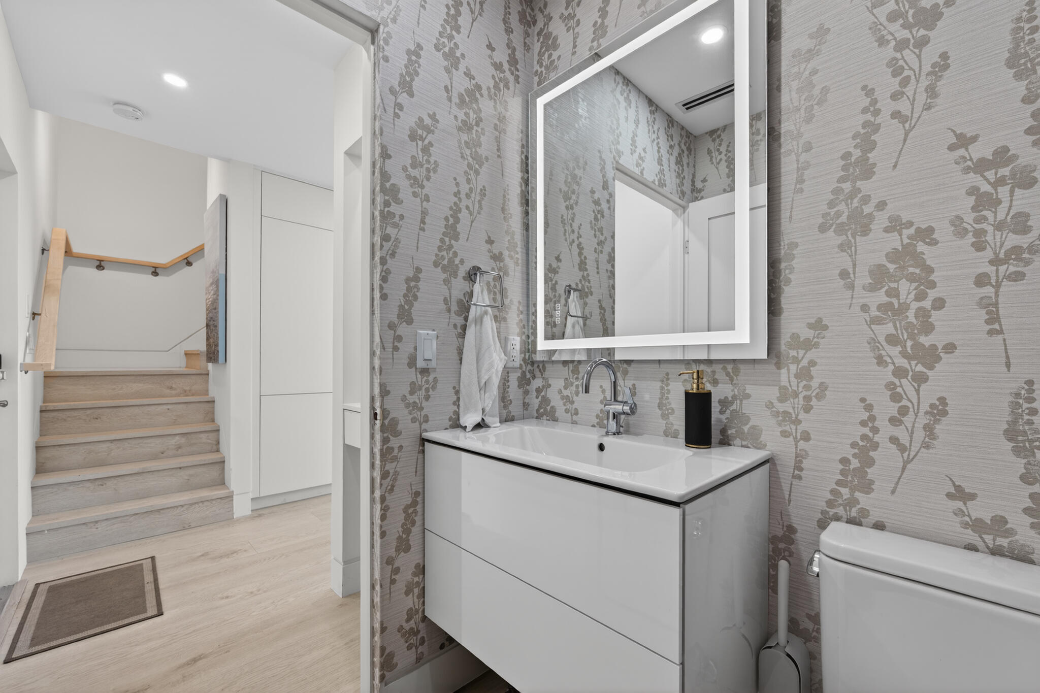 5720 Old Ocean Boulevard, Unit 5E Ocean Ridge, FL 33435 - Photo 14 of 29 a bathroom with a sink and a mirror
