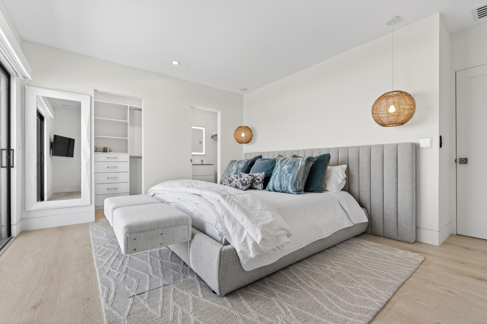 5720 Old Ocean Boulevard, Unit 5E Ocean Ridge, FL 33435 - Photo 16 of 29 a bedroom with a large bed and a large window