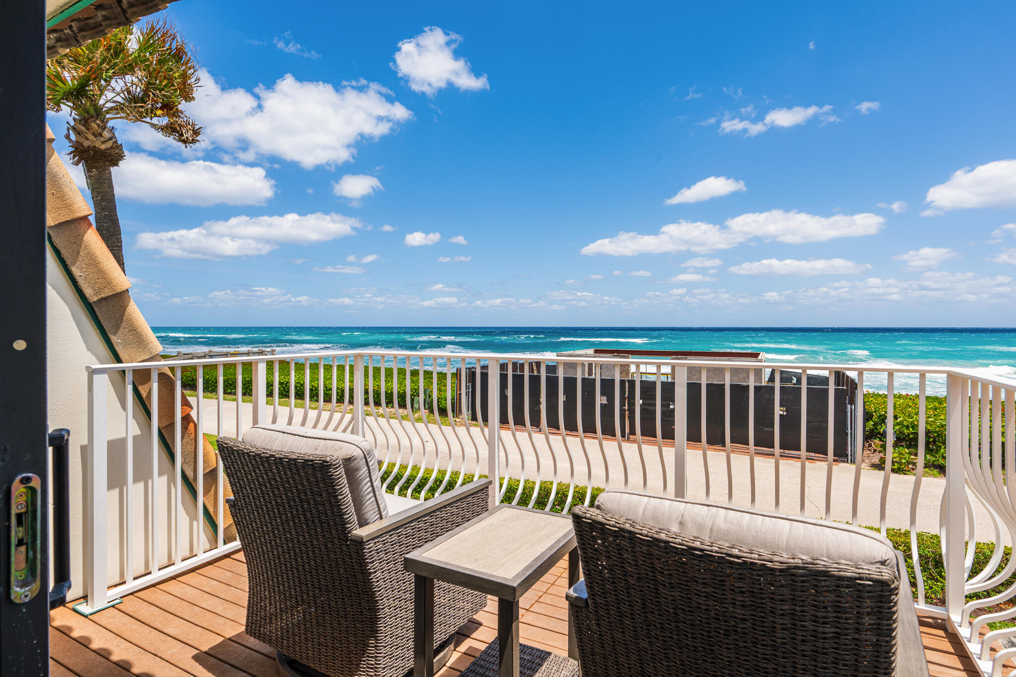 5720 Old Ocean Boulevard, Unit 5E Ocean Ridge, FL 33435 - Photo 19 of 29 a view of a chair in the balcony