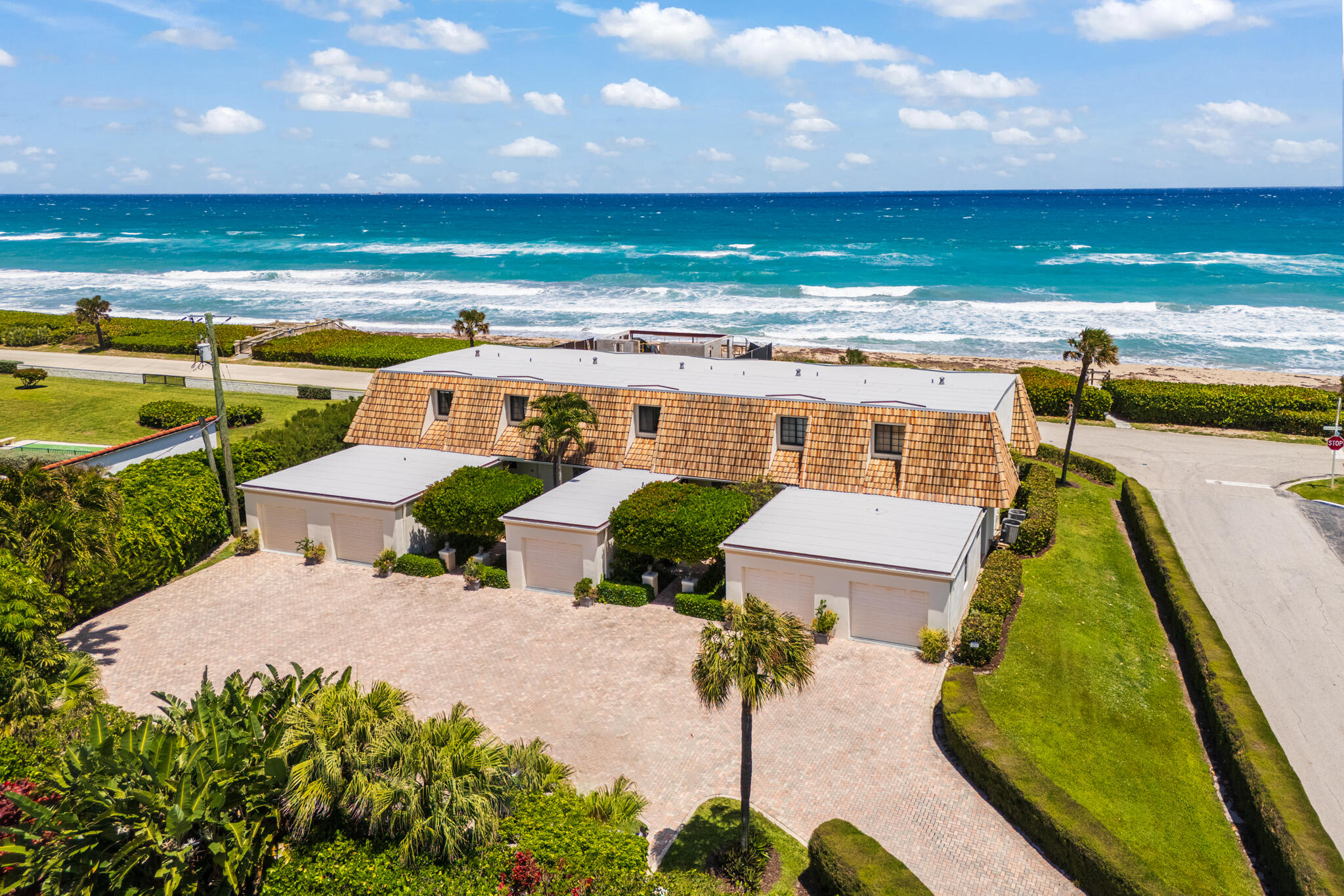 5720 Old Ocean Boulevard, Unit 5E Ocean Ridge, FL 33435 - Photo 27 of 29 a view of a swimming pool with an ocean view