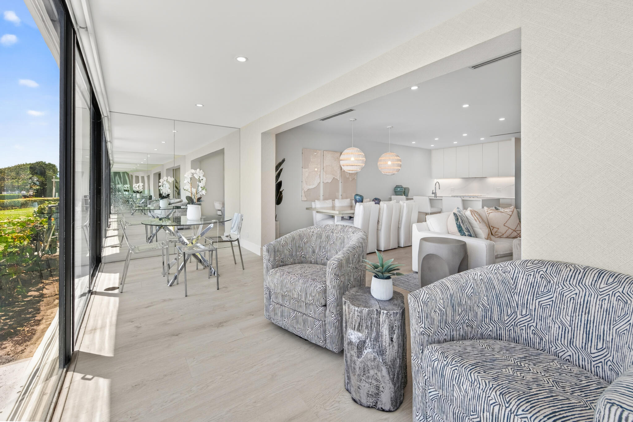 5720 Old Ocean Boulevard, Unit 5E Ocean Ridge, FL 33435 - Photo 5 of 29 a living room with furniture and a large window