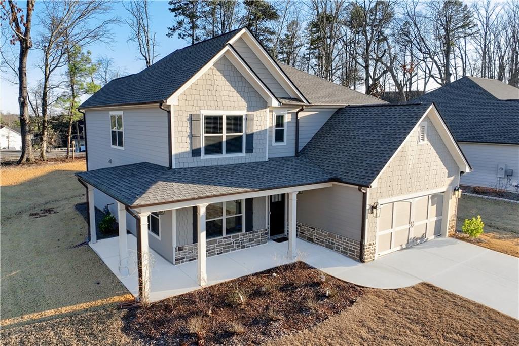 1647 Jasper Drive Winder, GA 30680 - Photo 16 of 16 a view of a house with a yard