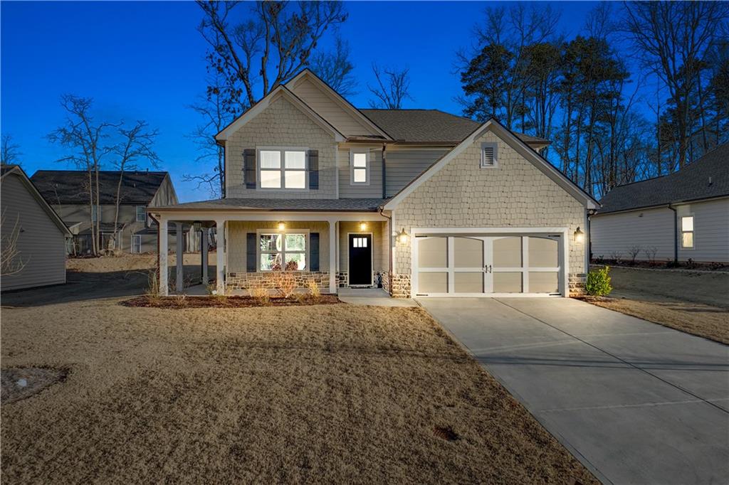 1647 Jasper Drive Winder, GA 30680 - Photo 2 of 16 a front view of a house with a yard