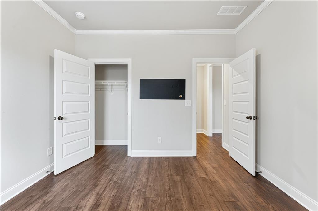 1647 Jasper Drive Winder, GA 30680 - Photo 6 of 16 wooden floor in an empty room