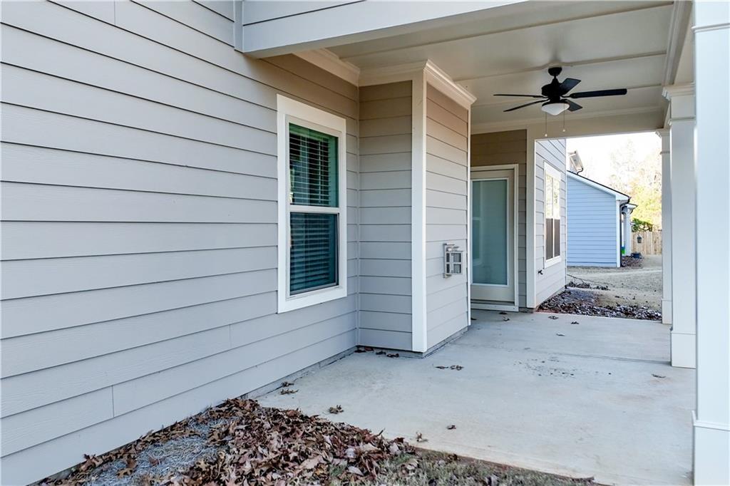 1647 Jasper Drive Winder, GA 30680 - Photo 8 of 16 a view of a house with a wooden door