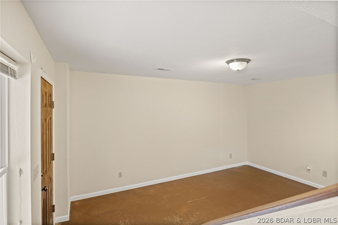 122 Hicks Drive Eldon, MO 65026 - Photo 28 of 51 View of family room from steps