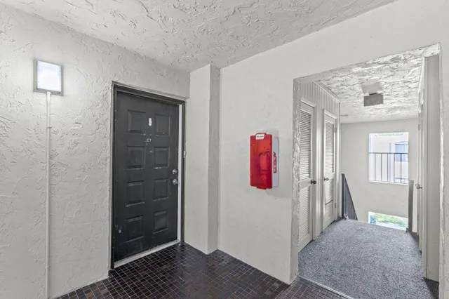 a view of a hallway with a elevator