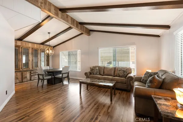 a view of gallery with wooden floor