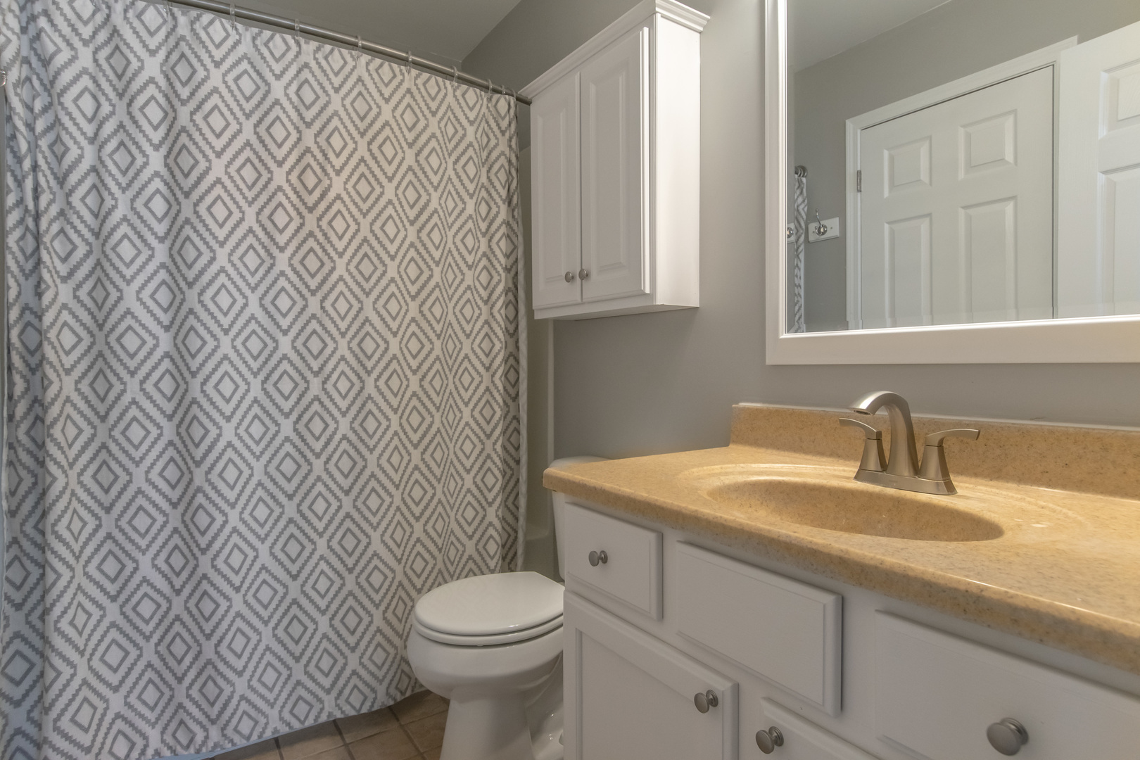 1938 Ashbrooke Road Romeoville, IL 60446 - Photo 14 of 42 a bathroom with a sink a toilet and vanity