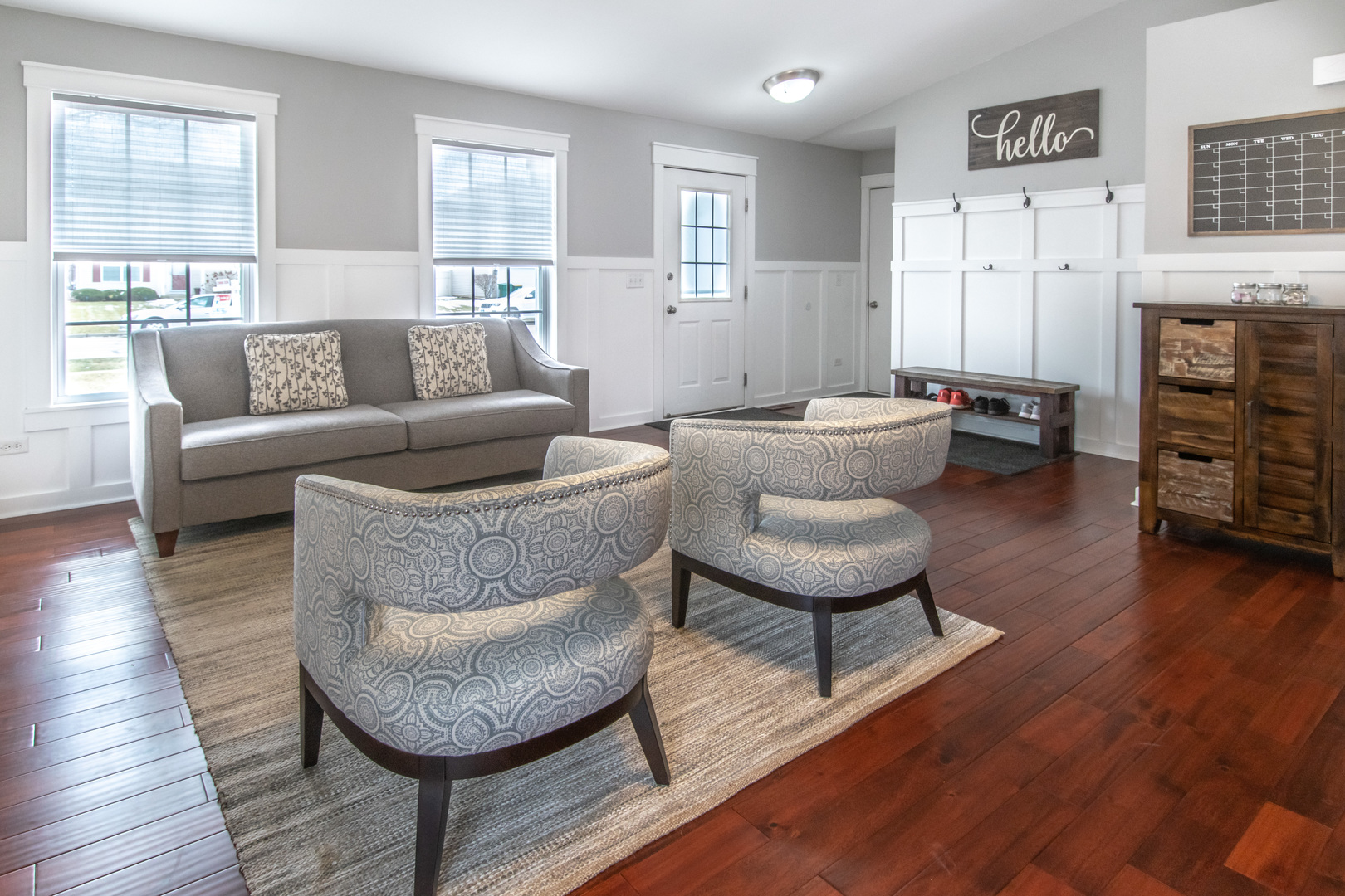 1938 Ashbrooke Road Romeoville, IL 60446 - Photo 3 of 42 a living room with furniture and a wooden floor