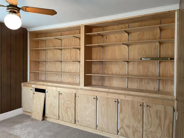 a view of walk in closet with window