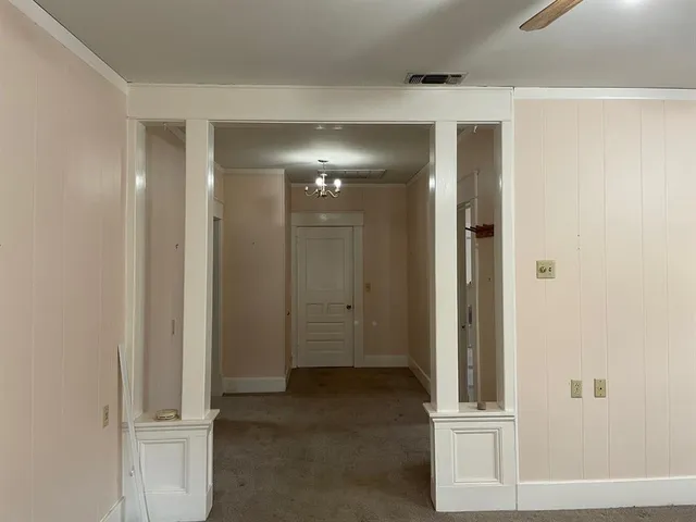 a view of a bathroom with a glass door