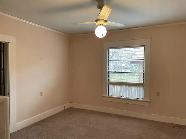 a kitchen with cabinets appliances and a sink
