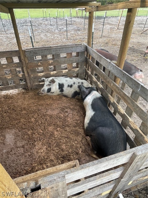 13434 Tangelo Avenue Clewiston, FL 33440 - Photo 12 of 42 a view of a glass door with a yard