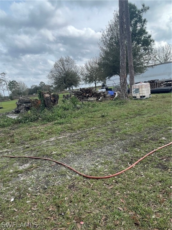 13434 Tangelo Avenue Clewiston, FL 33440 - Photo 20 of 42 a view of outdoor space and yard