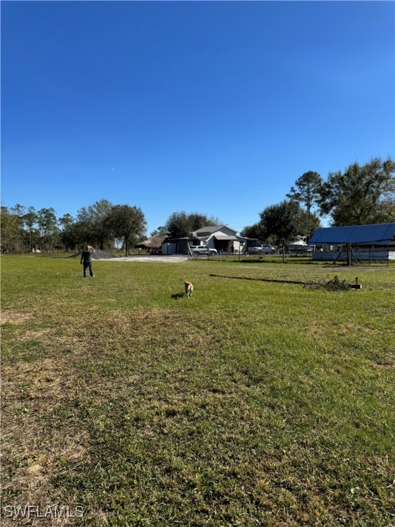 13434 Tangelo Avenue Clewiston, FL 33440 - Photo 37 of 42 a view of a large body of water with a building in the background