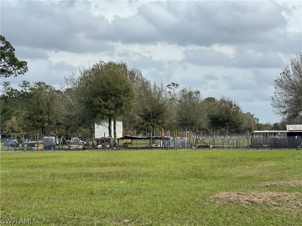 13434 Tangelo Avenue Clewiston, FL 33440 - Photo 7 of 42 a view of yard with green space