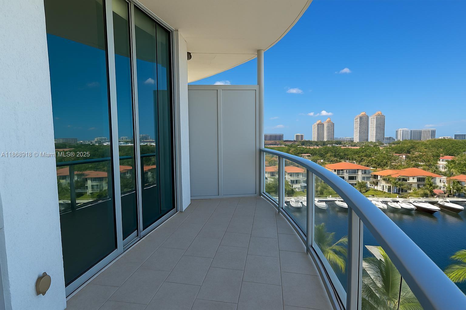 3029 Northeast 188th Street, Unit 924 Aventura, FL 33180 - Photo 11 of 20 a balcony with city view