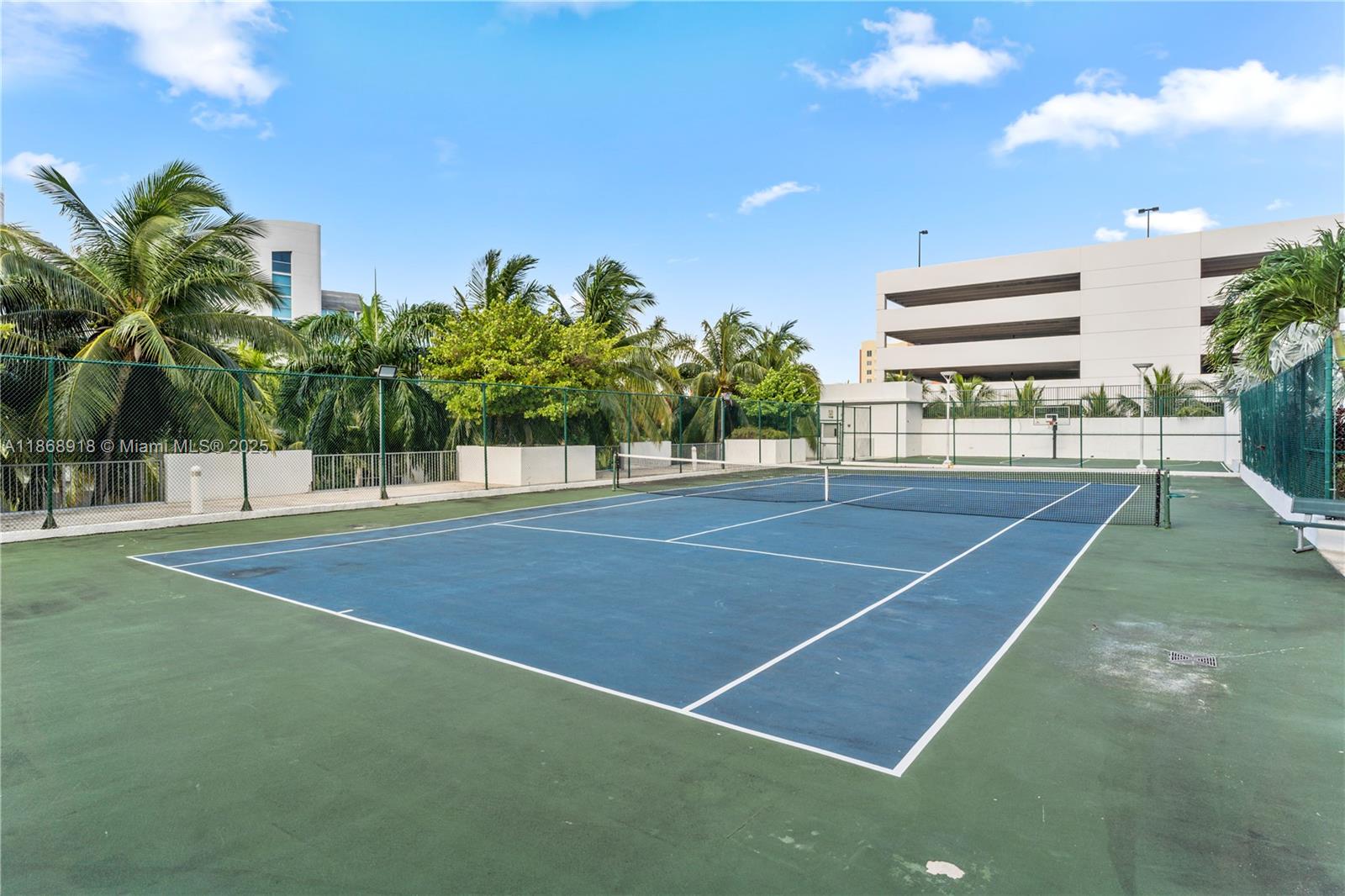 3029 Northeast 188th Street, Unit 924 Aventura, FL 33180 - Photo 17 of 20 a view of a tennis court