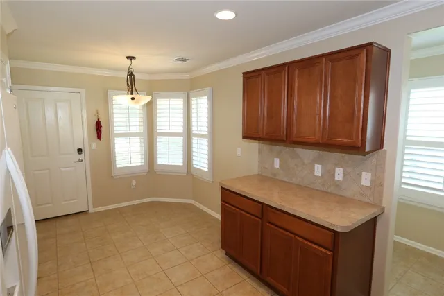 a bathroom with a sink a vanity and a mirror