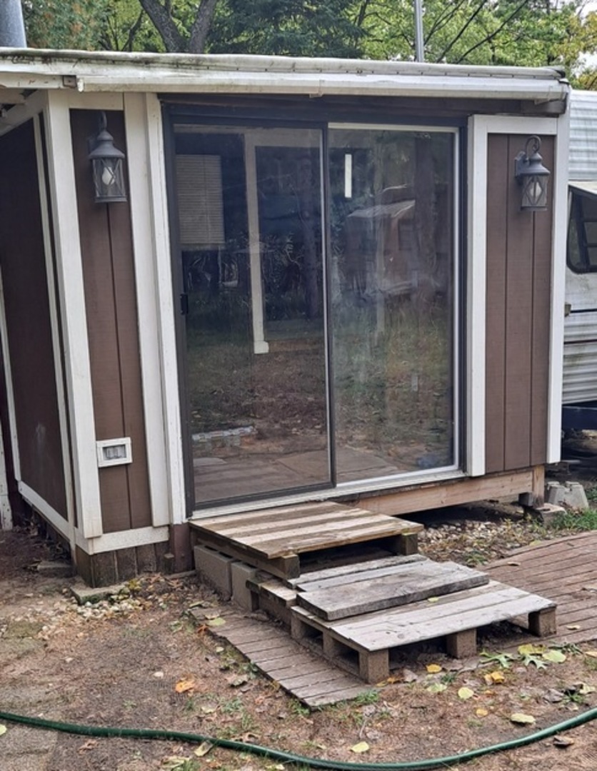 4-152 Woodhaven Lakes Sublette, IL 61367 - Photo 3 of 11 a view of house with a small space