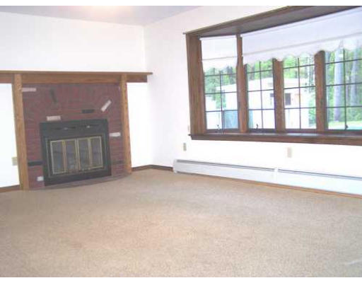 487 Reservoir Road Lunenburg, MA 01462 - Photo 14 of 22 a view of an empty room with a window