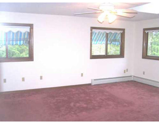 487 Reservoir Road Lunenburg, MA 01462 - Photo 16 of 22 an empty room with a window