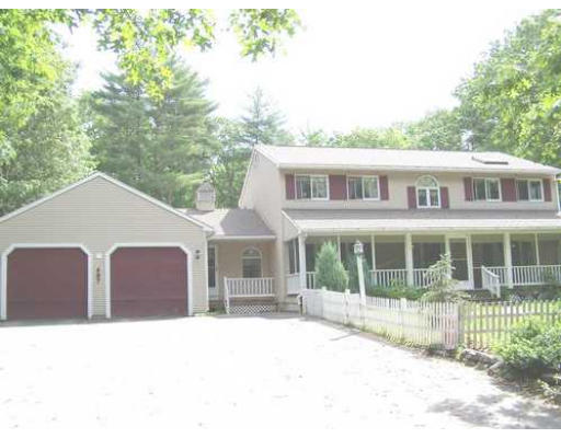 487 Reservoir Road Lunenburg, MA 01462 - Photo 4 of 22 a outdoor view of a house with a backyard and balcony