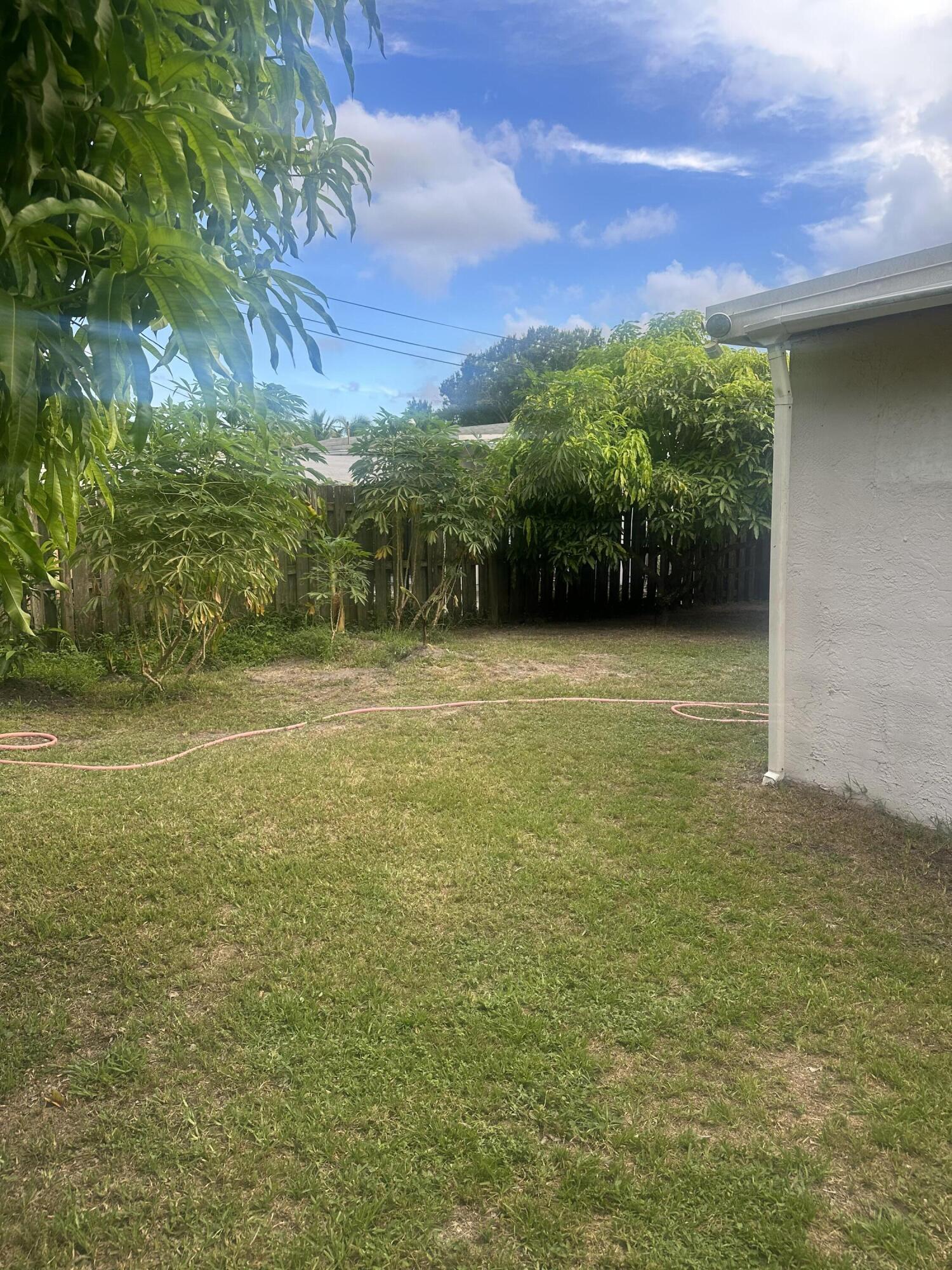 916 Caroline Avenue West Palm Beach, FL 33413 - Photo 14 of 14 a view of a lake view