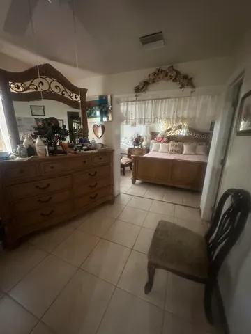 a room with furniture and a chandelier