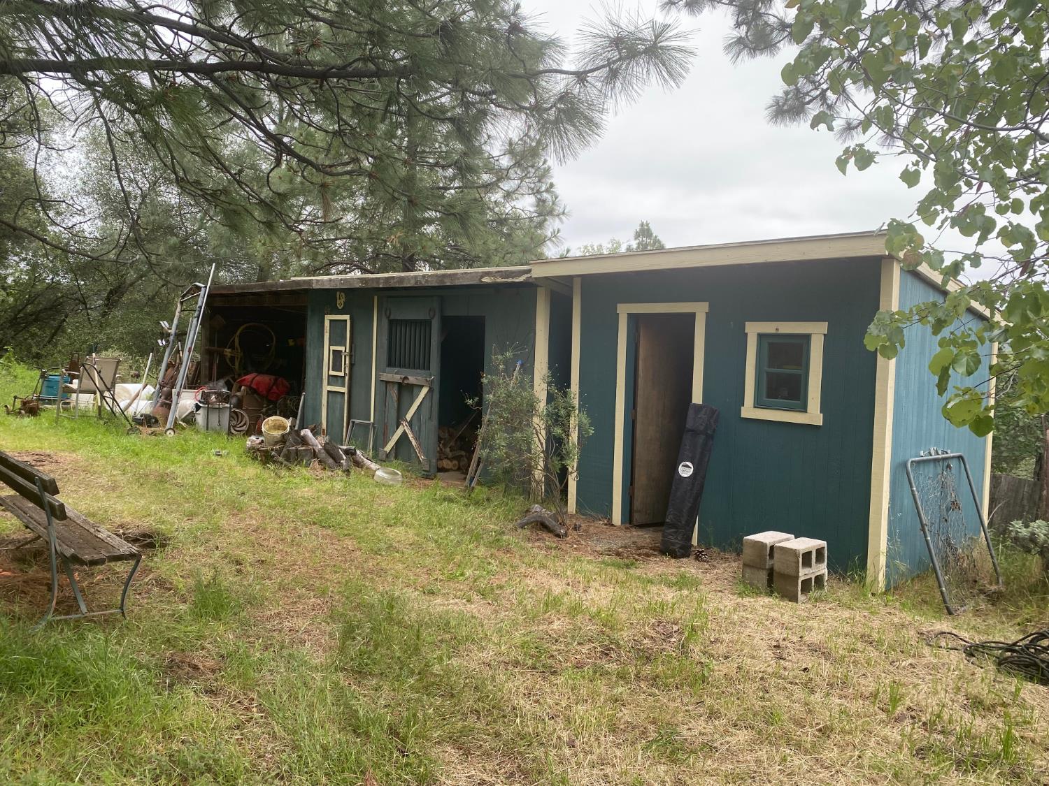 5021 Banbury Cross Road Shingle Springs, CA 95682 - Photo 87 of 92 One of the upper outbuilding, has a wood shed in it with storage